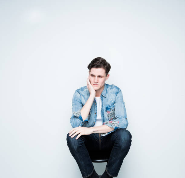 istock Handsome young man feeling depressed and sad 1142868471