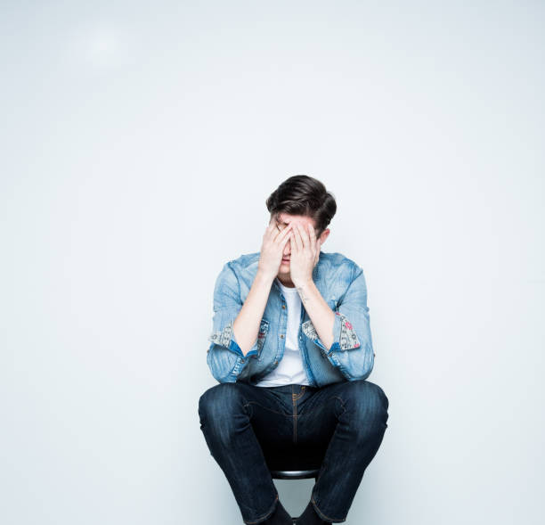 istock Handsome young man feeling depressed and sad 1142868652