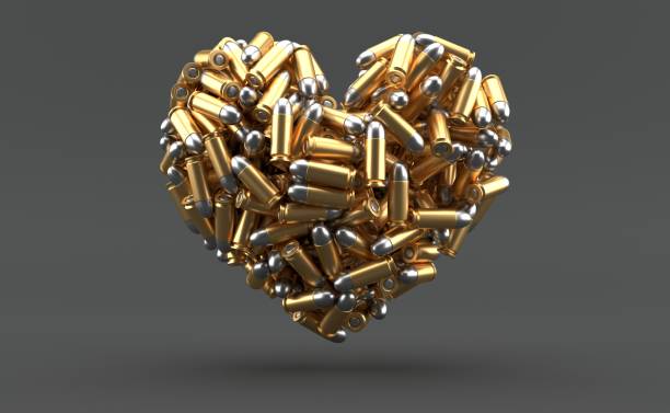Ammunition in heart shape stock photo