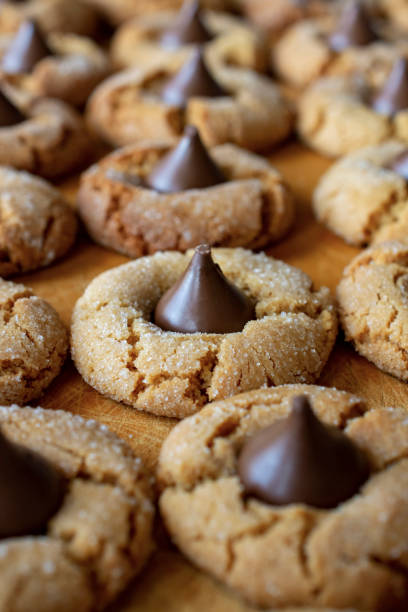 istock Peanut butter blossom cookies with a vertical crop. 1142876562