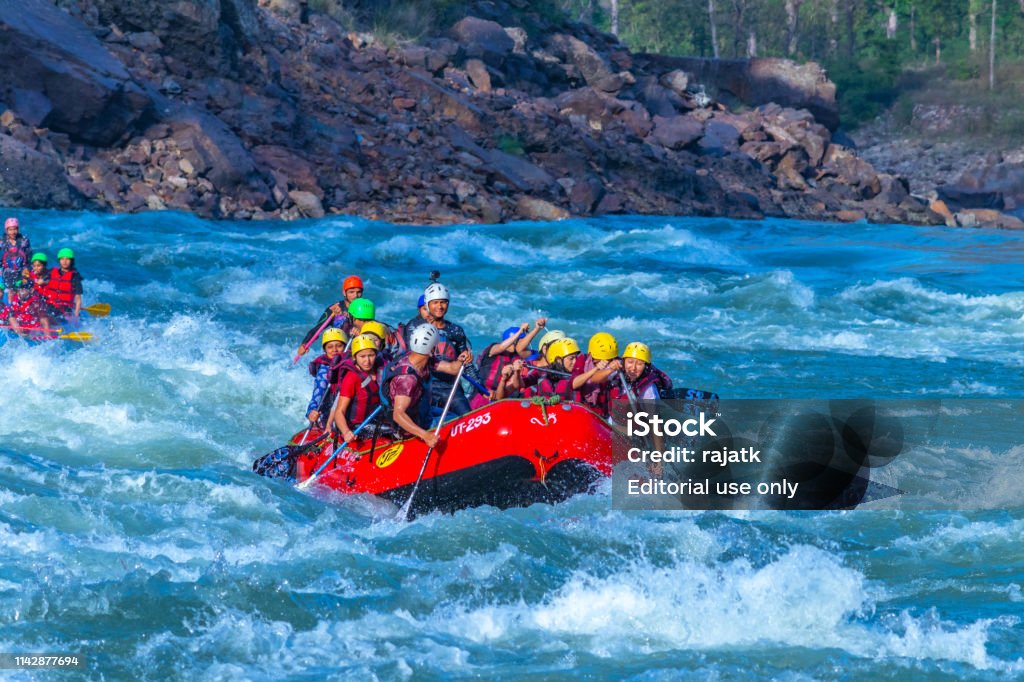 Water Rafting India Young People Enjoying Whitewater River Rafting In River Ganges ...