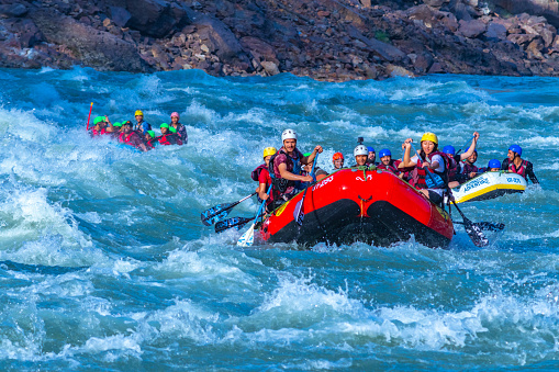 Water Rafting In Rishikesh Young People Enjoying Whitewater River Rafting In River Ganges ...