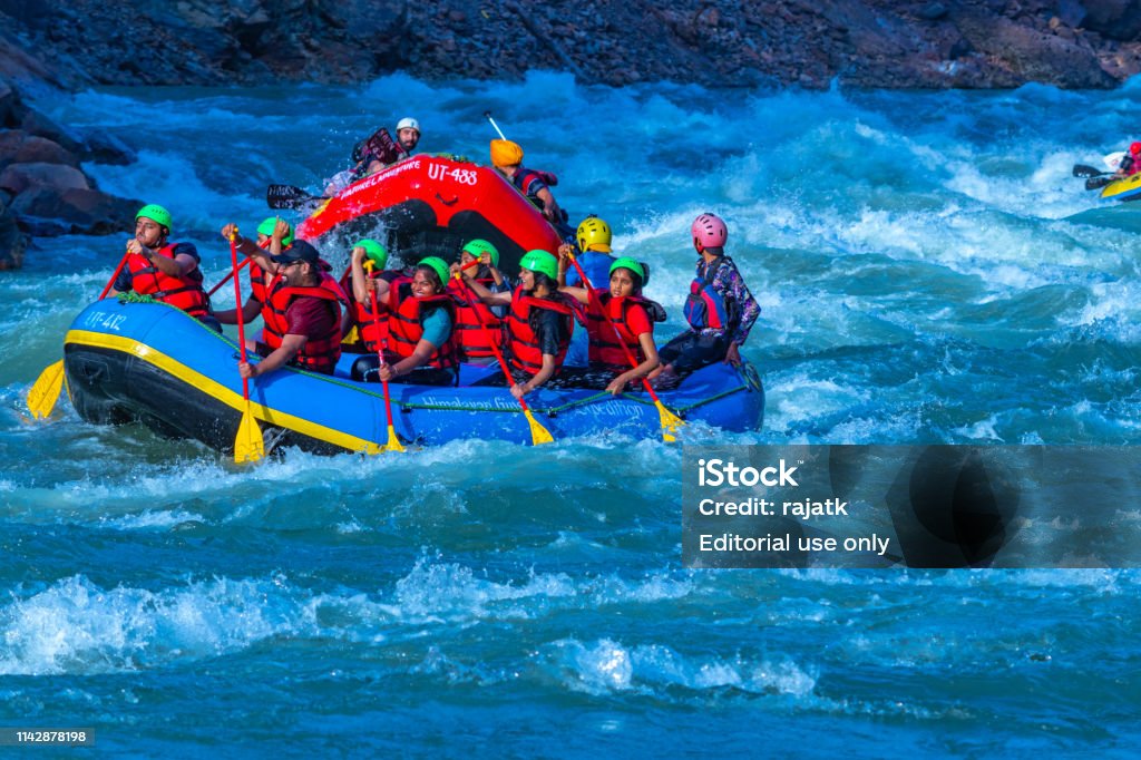 India Rafting Young People Enjoying Whitewater River Rafting In River Ganges ...