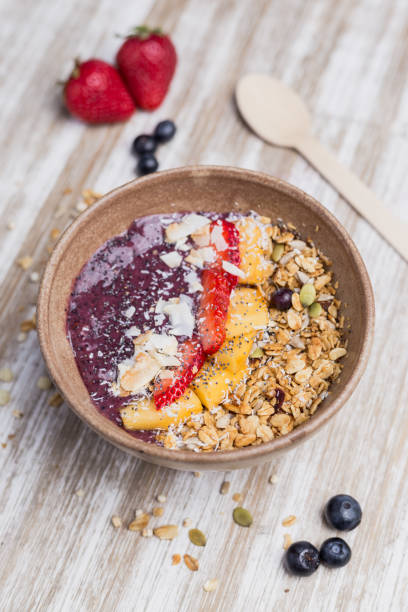 istock Healthy mango dessert with oat and yogurt 1142886914