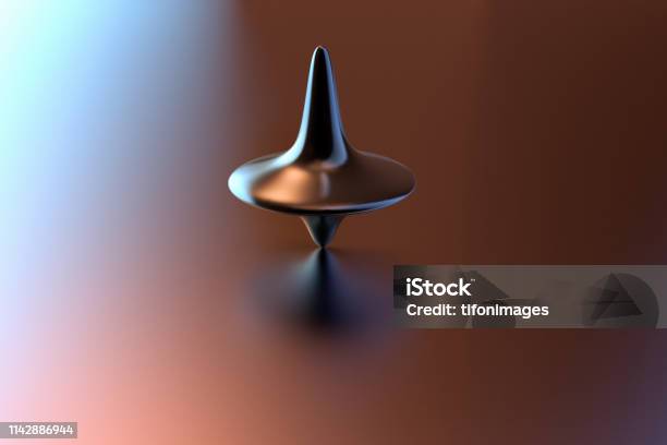A Spinning Top On Motion Stock Photo - Download Image Now - Spinning Top, Spinning, Turning