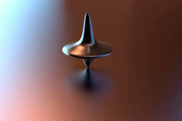 Photo of a spinning top on motion