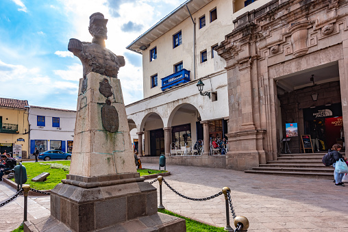 Plaza de Armas, the town center of the city of Cusco, Peru. Tourists walking around the busy square.