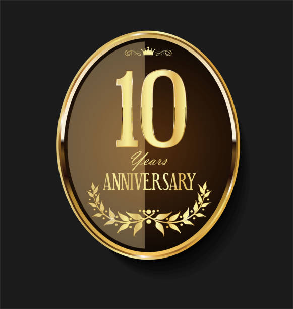istock Golden shield and laurel wreath anniversary retro design 10 years 1142890231