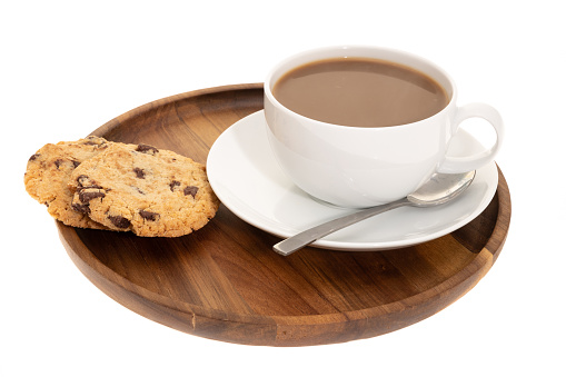 Chocolate chip cookies and a hot drink - white background