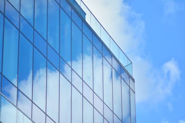 istock Blue clean glass wall of modern office building 1142896539