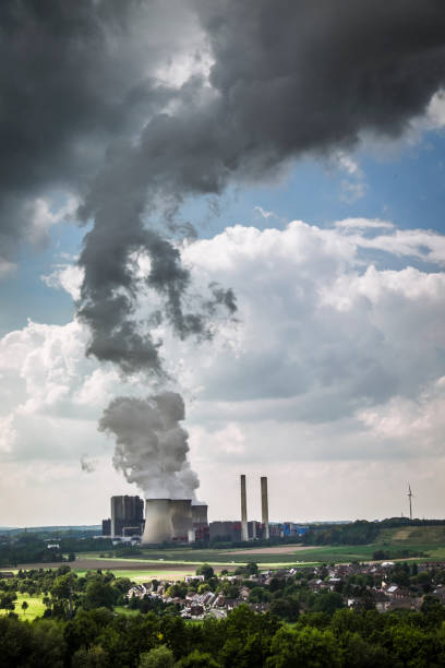 istock Coal-fired Power station with Cooling towers showing evaporating water 1142898008