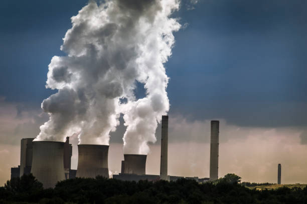 istock Coal-fired Power station with Cooling towers showing evaporating water 1142898049