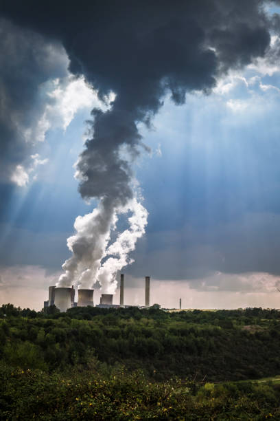 istock Coal-fired Power station with Cooling towers showing evaporating water 1142898111