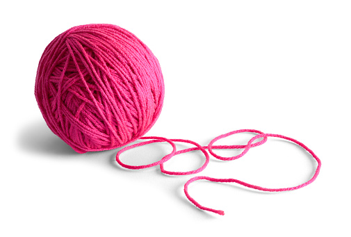 Pink Yarn Ball Isolated on White Background.