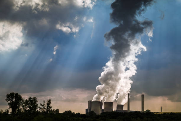 istock Coal-fired Power station with Cooling towers showing evaporating water 1142898806