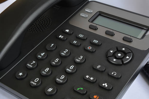 istock Telephone set with display and buttons. Modern phone for ip-telephony. 1142899021