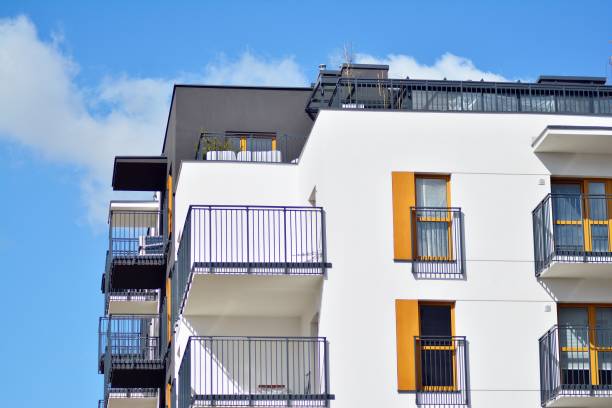 istock Brand new apartment building on sunny day 1142899245