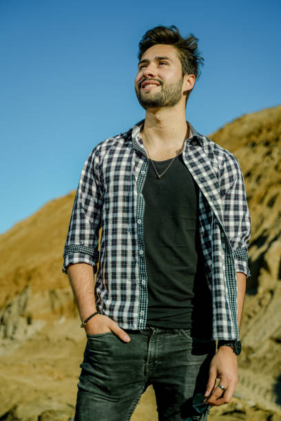 istock Young man enjoying the spring sun. 1142899321