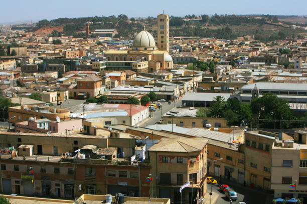view of asmara, the capital city of eritrea, from the bell tower of the church of our lady of the rosary or the cathedral. - our lady of africa imagens e fotografias de stock