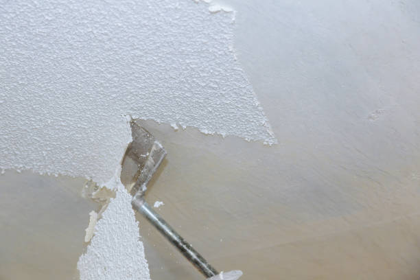 Removal old dirty popcorn ceiling wall background stock photo