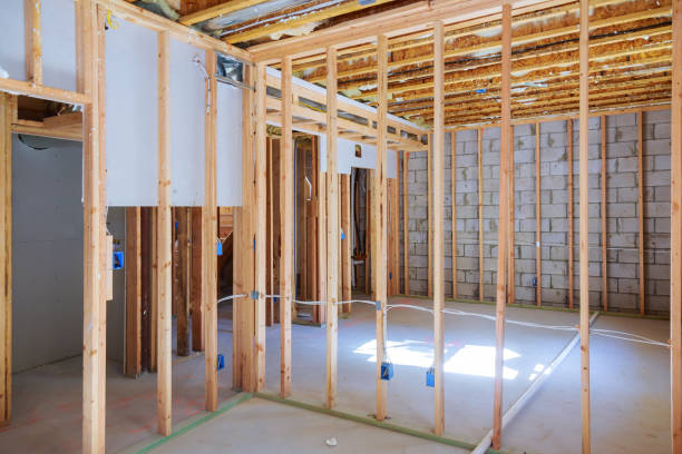 New residential construction home framing with basement view New under construction home framing unfinished wood frame building of a basement residential basement stock pictures, royalty-free photos & images