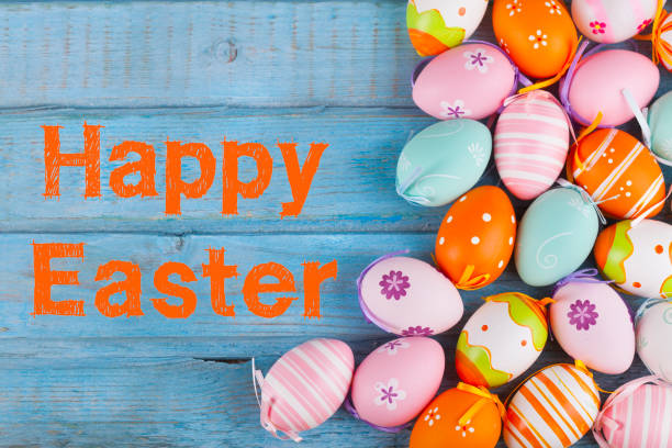 istock Colorful Easter eggs on turquoise rustic wooden table 1142907546