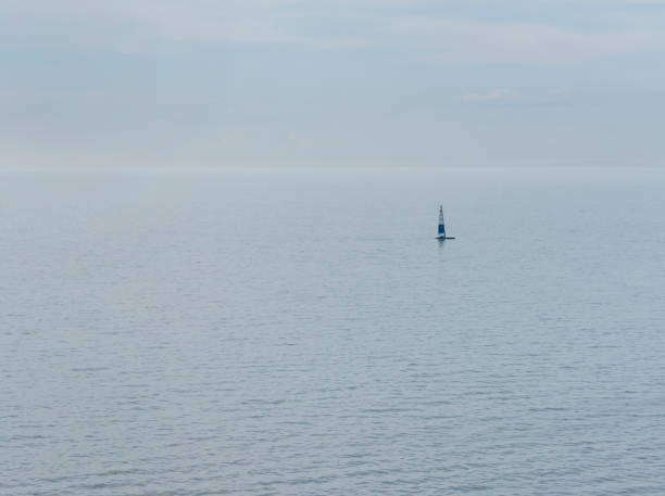 istock Sailing Boat in the horizon 1142907896