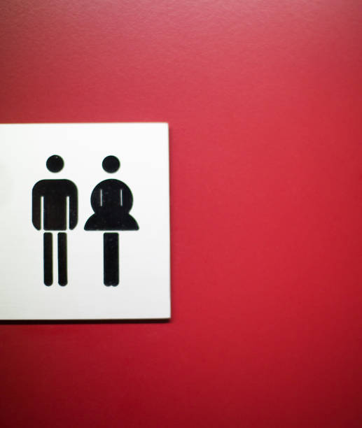 istock Public Restroom Sign on Red Door 1142909214