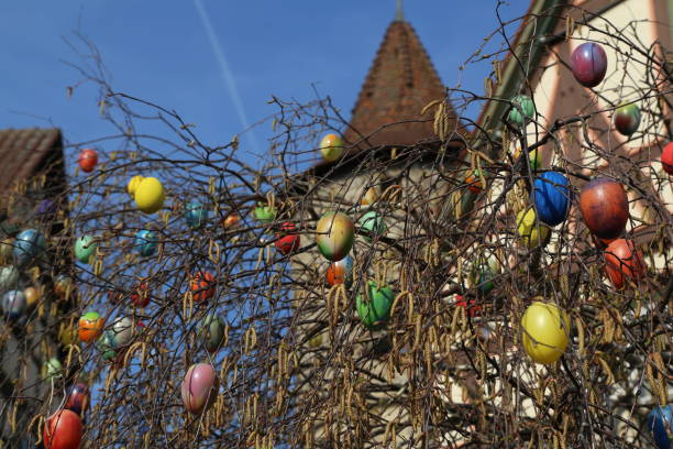 Decorative Easter eggs on a fountain in the city
