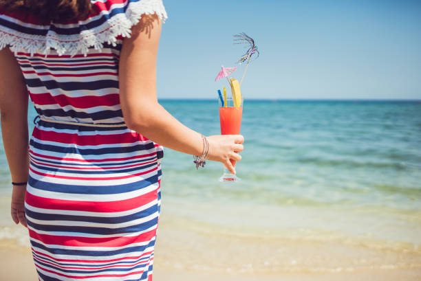 Enjoying cocktail on the beach