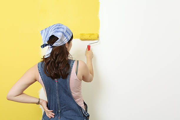 istock Painting the wall yellow 114291094