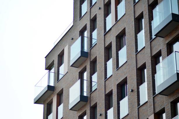 istock Modern condo building with huge windows 1142912020