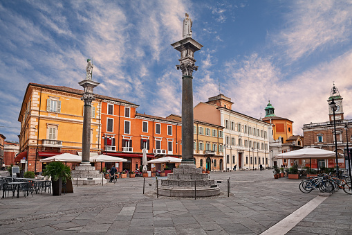 Ravenna, Emilia-Romagna, Italy: the main square Piazza del Popolo with the ancient buildings and the columns with the statues of Saint Apollinare and Saint Vitale