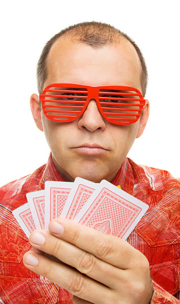 istock Gambler holding playing cards 114291384