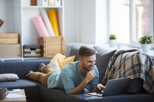 istock Young Man Relaxing at Home 1142921807