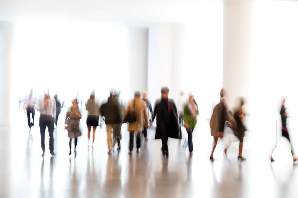 istock Crowd of Motion Blurred Business People 1142921955