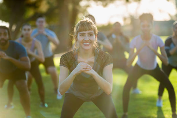 istock Squatting in the park 1142928298