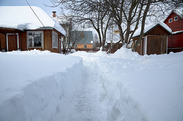 istock Snow track to the cottage door 114294577