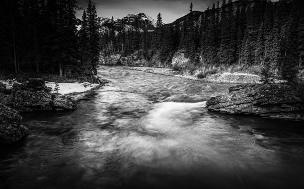 istock Black and White image of the Widowmaker Kananaskis River 1142946361