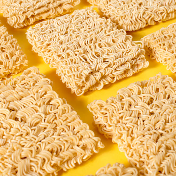 istock Instant noodles on a yellow background 1142954341