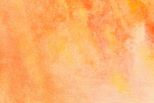 istock orange watercolor pastel painted on paper background texture 1142960111