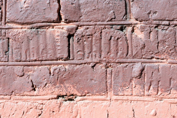 istock Painted brick wall texture close up. Brick wall background 1142960802