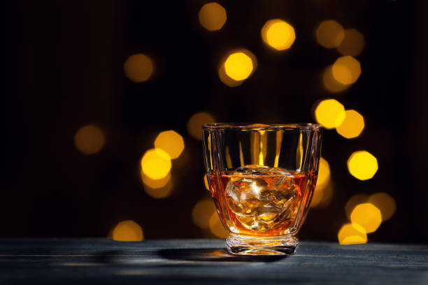 istock whiskey with ice cubes in glass 1142962376