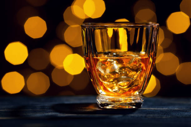 istock whiskey with ice cubes in glass 1142962384