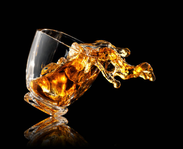 istock splash of whiskey in glass 1142962403