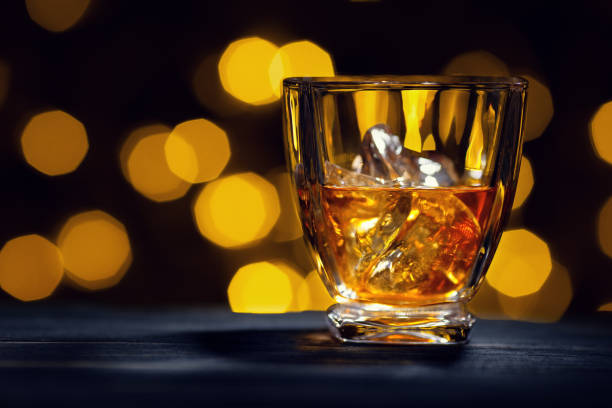 istock whiskey with ice cubes in glass 1142962404