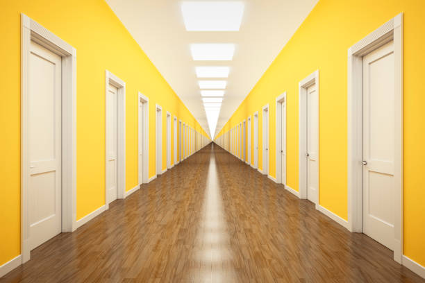 an endless corrior with lots of white doors