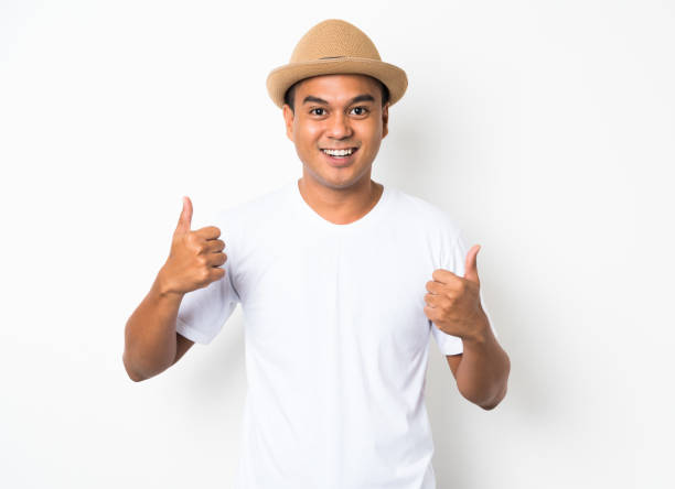 istock Asian man is feeling happy celebrate with two hand stretch on white background. 1142965138
