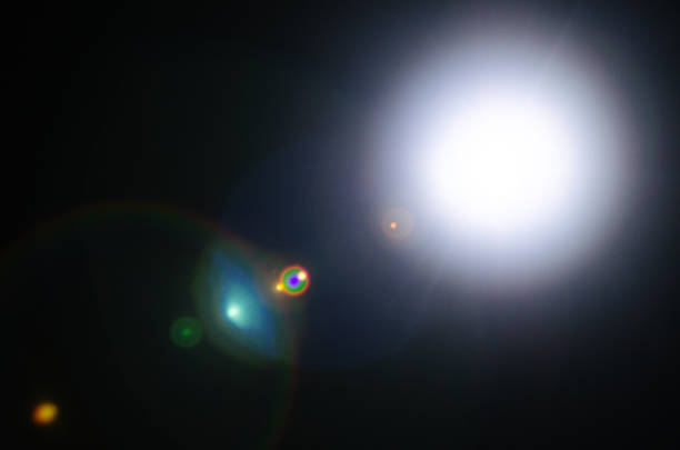 istock Abstract Natural Sun flare or Far star on the black background 1142965562