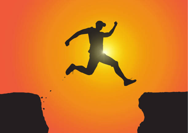 illustrations, cliparts, dessins animés et icônes de silhouette de l’homme sautant sur les falaises sur le fond d’or de lever du soleil, accomplissement, succès et illustration de vecteur gagnante de concept - saut